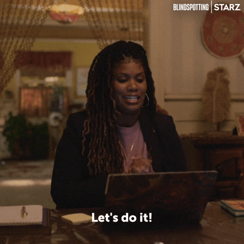 Woman sitting in front of the computer and text saying"Let's do it!"